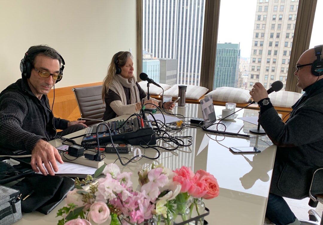 Podcast recording session with two guests and host