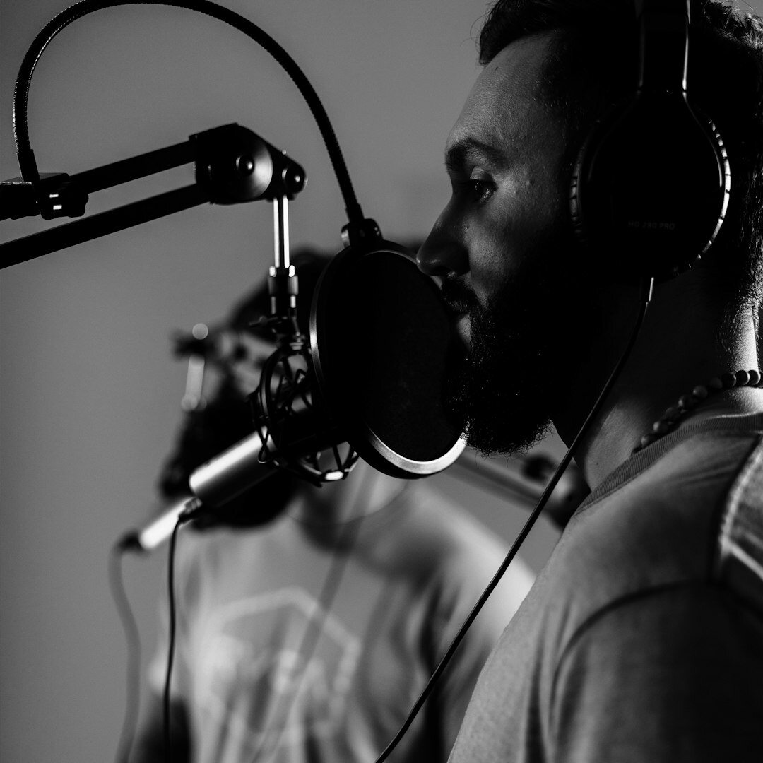 Professional Asian male audio engineer in studio